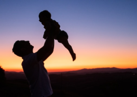 Man holding baby